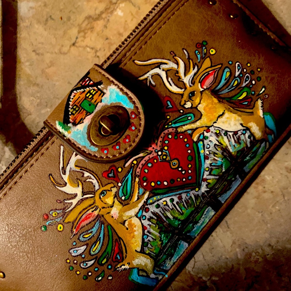 Beautiful hand painted vegan leather wallet.
